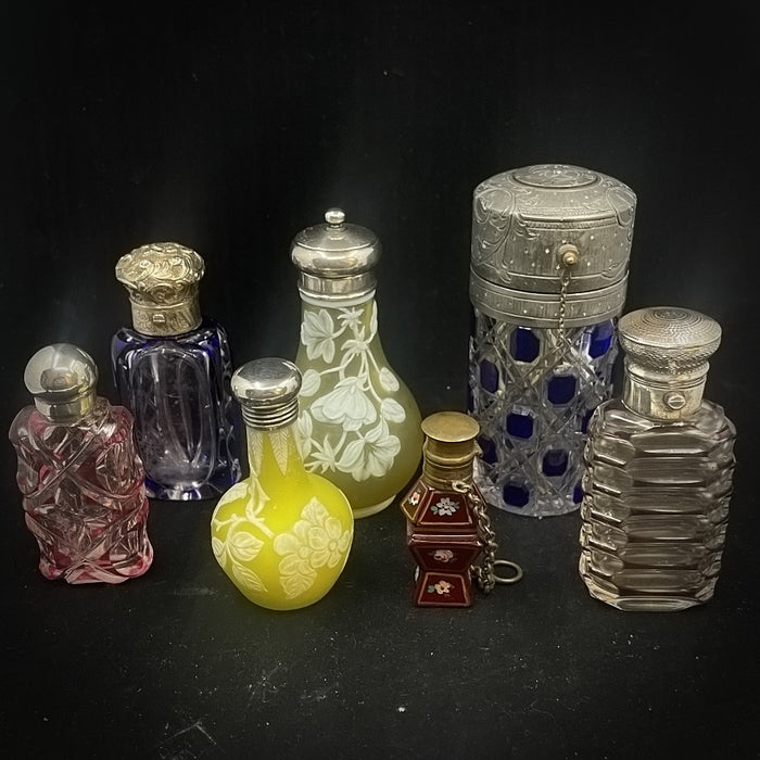 An Assortment Cut Crystal & Sterling Silver Topped Perfume Bottles - Glen Manor Galleries
