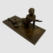 Bronze Statue of A reclined woman with raised hand. - GLen Manor Galleries 